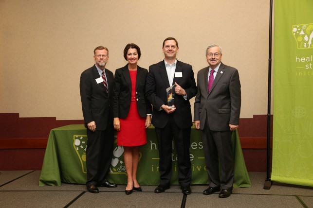 Pictured from left to right: Gerd Clabaugh, the Iowa Department of Public Health; Lt. Gov. Kim Reynolds; Doug Jeske, The Meyocks Group; and Gov. Terry Branstad.  