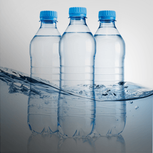 Bottles of Water Sitting in Water